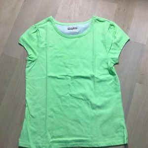 Girls green polka dotted t-shirt